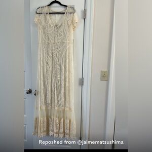 Never worn, tags attached. Size 00 Torrid Ivory Lace Maxi Dress.